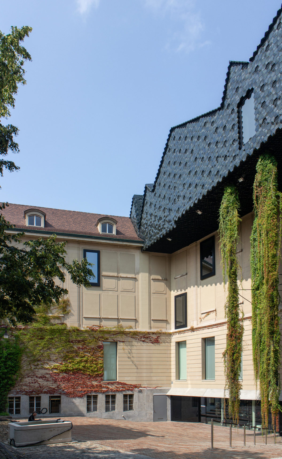 Museum-der-Kulturen_Herzong-Demeuron_WikiArquitectura_06